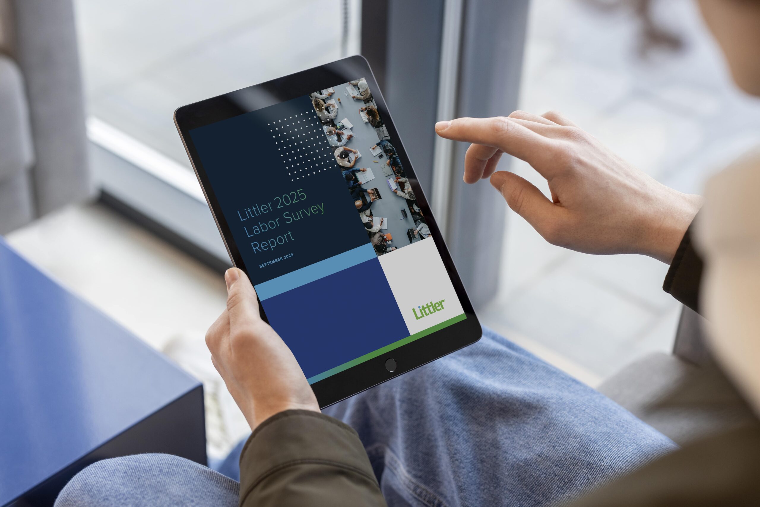 Employer viewing the Littler Report on a screen