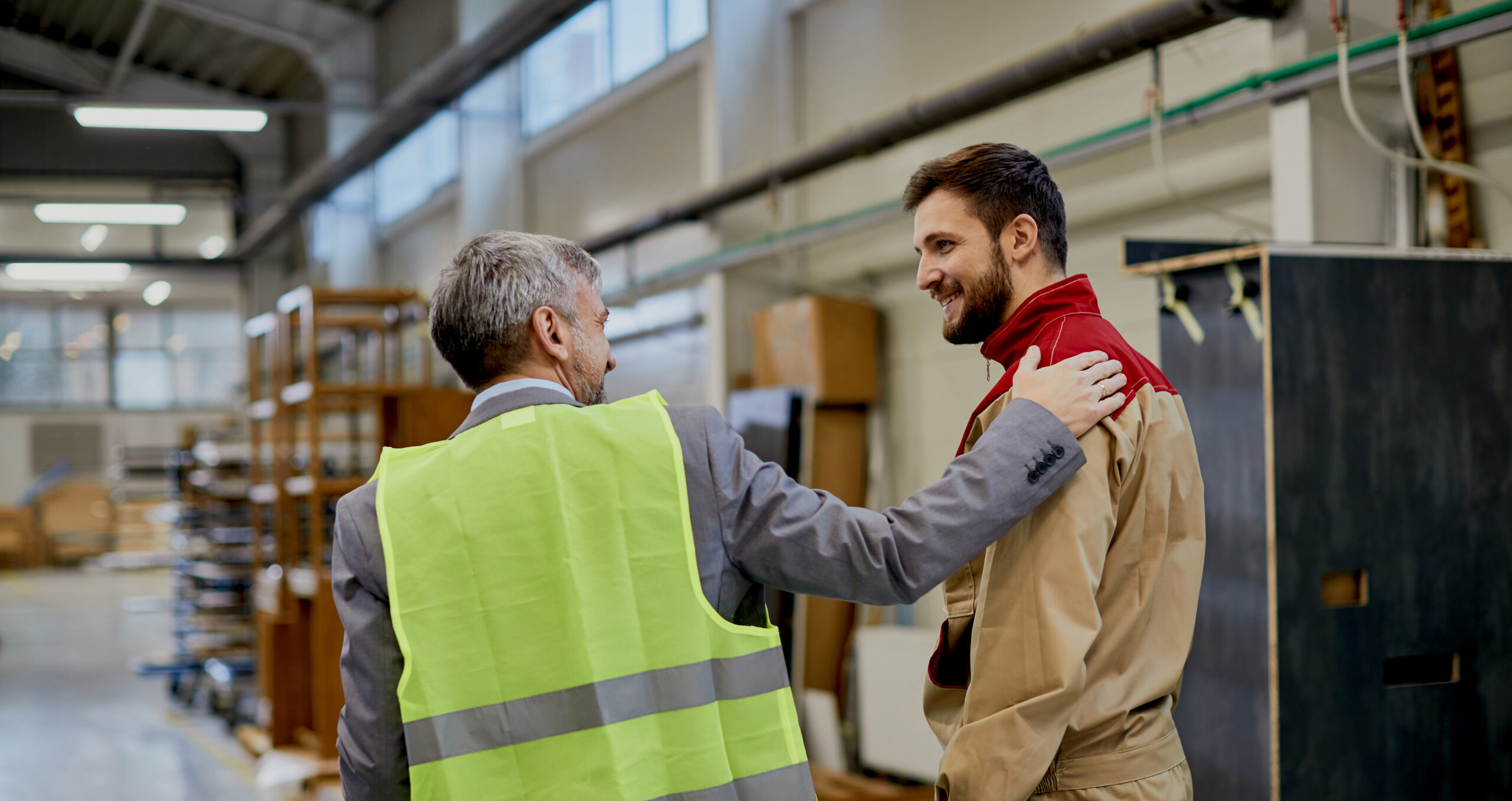 Worker being reassured by friendly manager